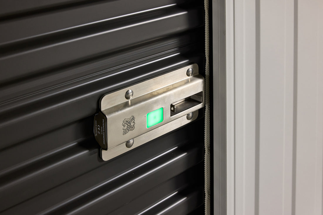 Nokē Smart Entry lock with green light on a black unit door at Goodspace Rouse Hill