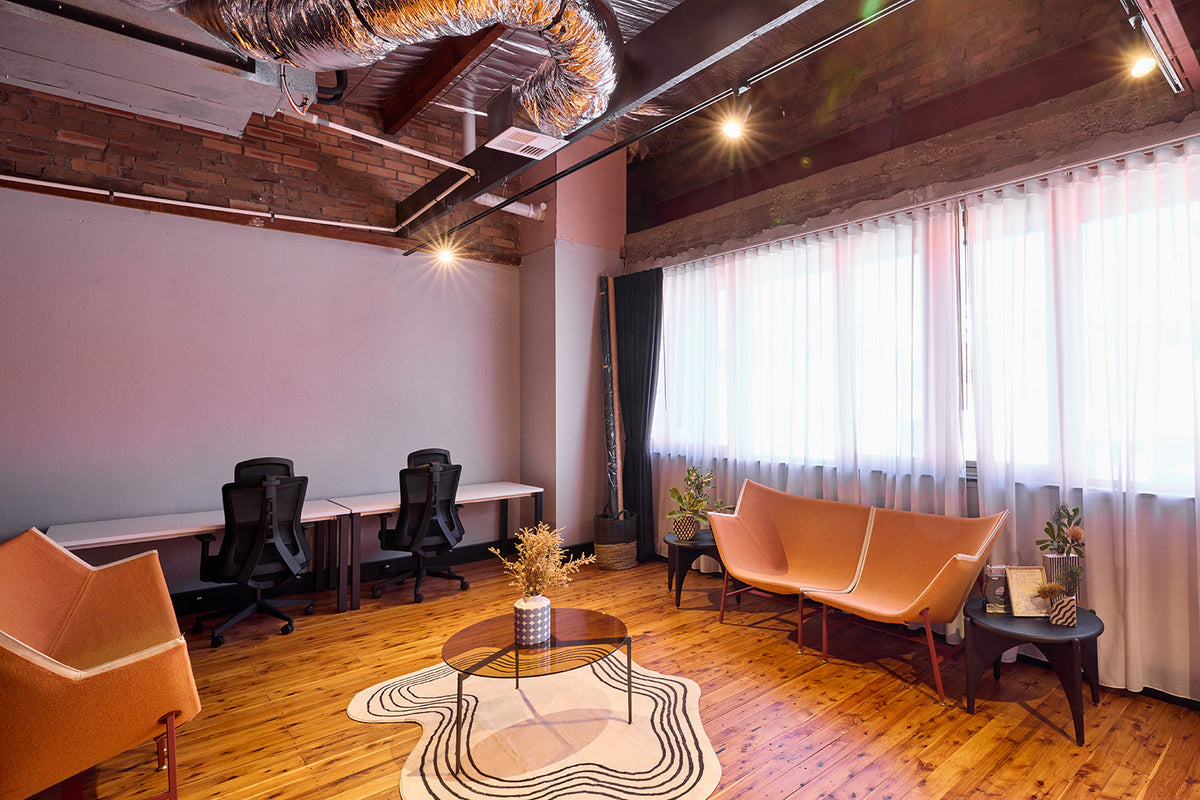 Styling and lounge area with sofas and natural light at Goodspace Kingsgrove, beside the photography studio